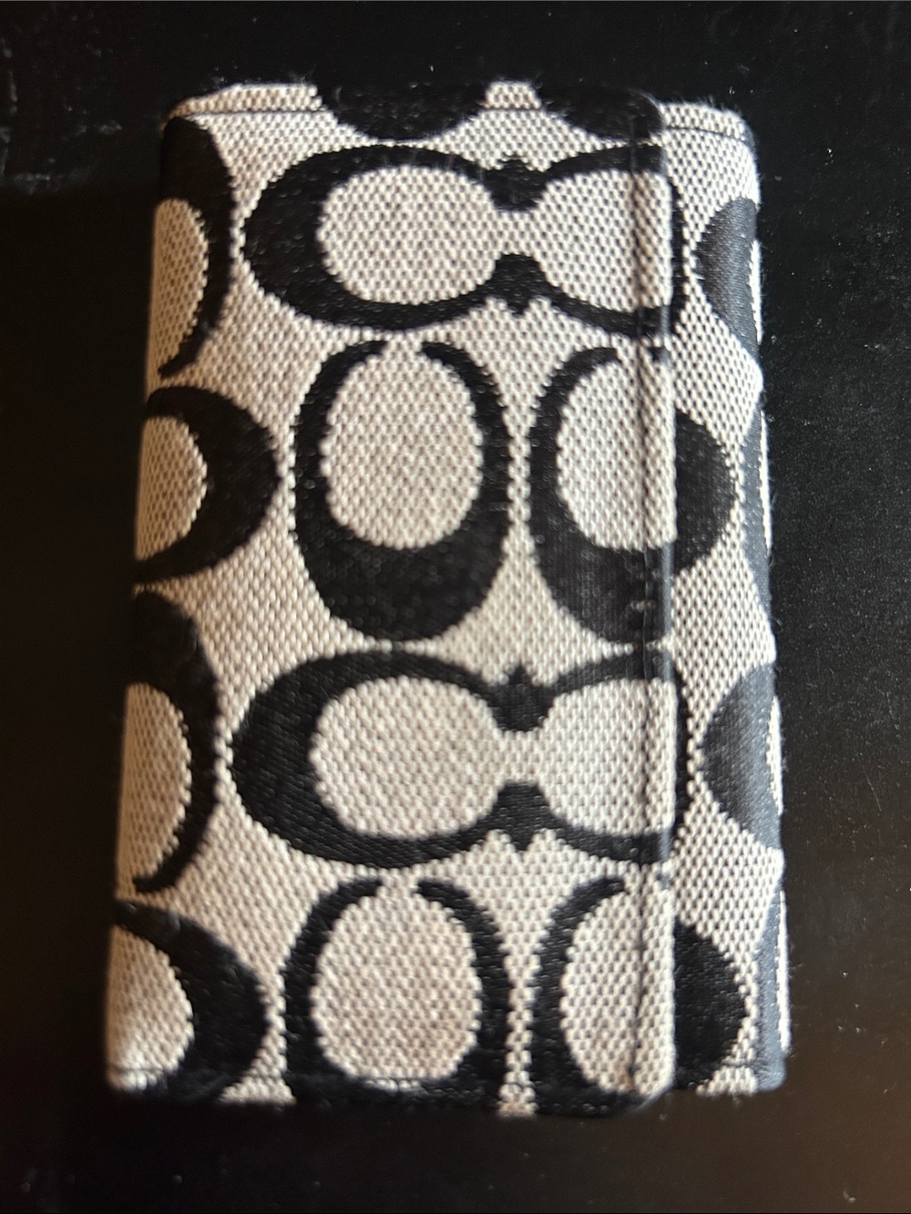Coach Black and Cream Signature Canvas key holder/wallet/card holder. 4x2 3/4”.